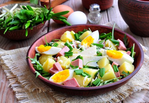 Salad Of Wild Garlic With Boiled Potatoes, Eggs, Ham, Parmesan And Arugula