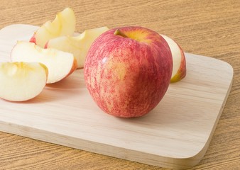 Ripe Red Apple on A Wooden Tray