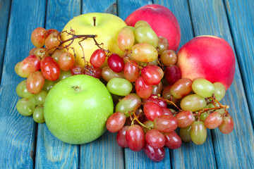 Naklejka na ściany i meble fresh ripe fruitson wooden table