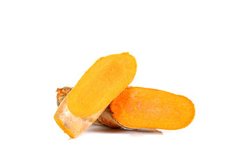 Yellow tumeric on white background.
