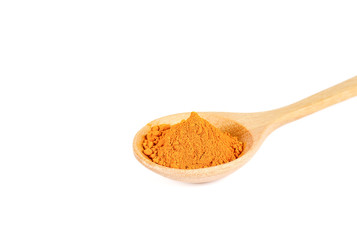 Turmeric powder in wooden spoon on white background.