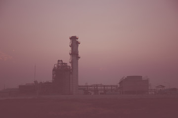 Fototapeta na wymiar Electric plant and sunset sky