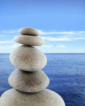 Balanced stones, sunny sea scene 