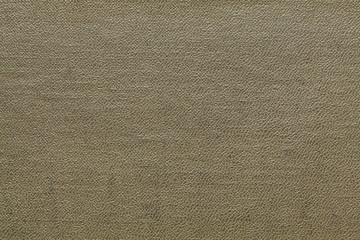 Fototapeta na wymiar Dirty brown stamped cardboard texture
