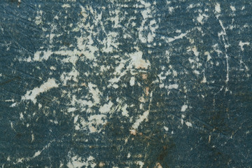 Badly damaged dark blue cardboard texture