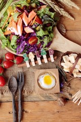 Fresh salad and egg with dressing delicious