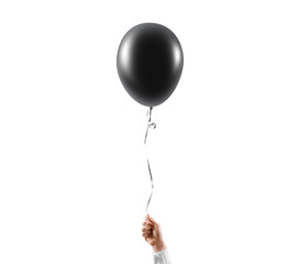 Hand hold blank black balloon mock up isolated.  © Alexandr Bognat