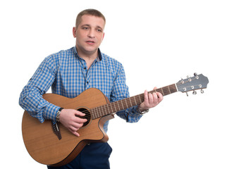 Obraz premium man holding a guitar and singing