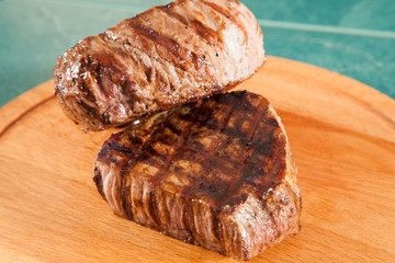 Grilled steak on a wooden board