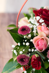 beautiful bouquet in basket on the table