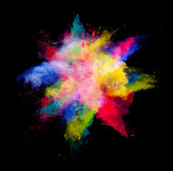 Explosion of colored powder on black background