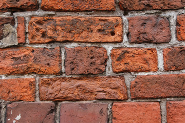 Naklejka premium Old Red brick wall background. Macro. close-up