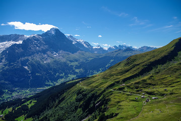 Sunny day view to the mountains vally from top of Mannlichen (Jungfrau region, Bern, Switzerland)