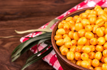 Buckthorn berries in bowl