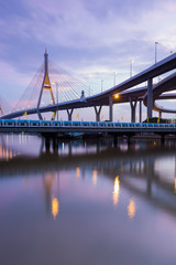 Suspension bridge river front and reflection ( Industrial Ring Road Bridge) in Bangkok Thailand