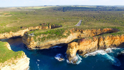 Loch Ard Gorge and Arch Island on the Great Ocean Road, aerial v