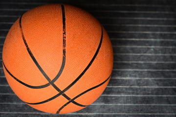 basketball on a black floor