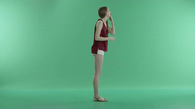 girl and blow kiss on a green screen