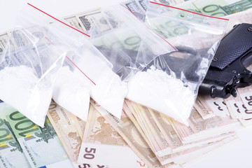 drugs,money,cocaine and gun
