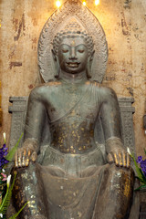 Phra Khandhararat green sandstone Dvaravati Buddha at Wat Na Phra Meru.