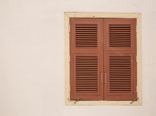 Wood windows on the white wall