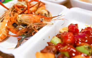Grilled prawns seafood in foam trays