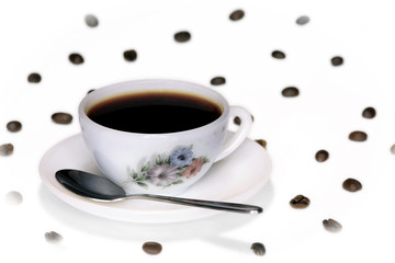 Coffee cup with coffee & spoon and beans isolated