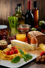 Composition with variety of organic food products - obrazy, fototapety, plakaty