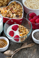 healthy snack - granola on wooden surface