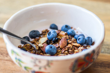 granola, yogurt and blueberry in a bowl 