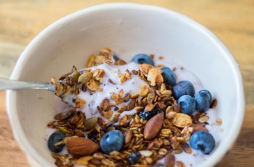 granola, yogurt and blueberry in a bowl 