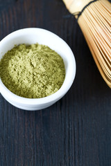 macha tea on wooden surface