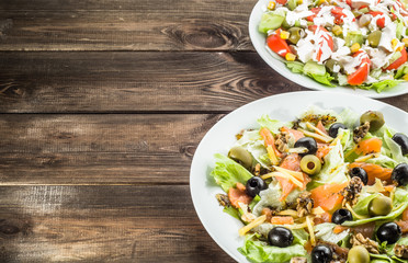 Set of salad with salmon and vegetables.