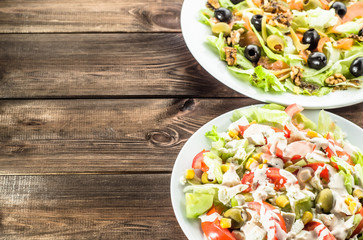 Set of salad with salmon and vegetables.