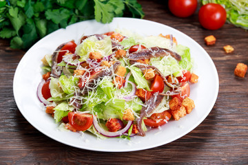 Fresh healthy Classic Caesar salad with anchovies