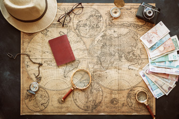 Fototapeta na wymiar travel concept, stylish notebook map and passport on craft background