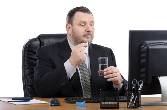 Business Man Takes Pill During Virtual Doctor Visit