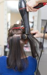 Fototapeta premium blow-drying in a beauty salon