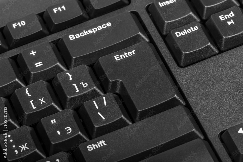 Fototapete Electronic collection - black computer keyboard with key enter