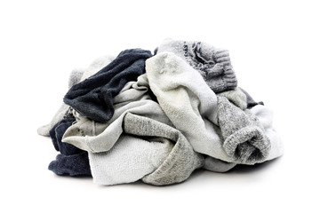 A lot of used socks isolated on a white background