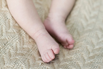 Obraz na płótnie Canvas Closeup of newborn baby feet