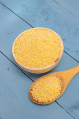 millet groats on the blue board