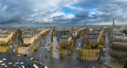 Panoramic view of Paris from the Arc de Triomphe. Autumn. Rain. Sun.