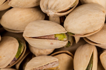 Pistachio nuts arranges as background