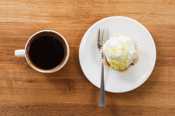 Sweet muffin and coffee. Overhead view