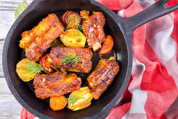 ribs fried with virgin olive oil in a frying pan