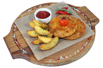 Two chicken rissoles with garnish of potato wedges baked, isolat