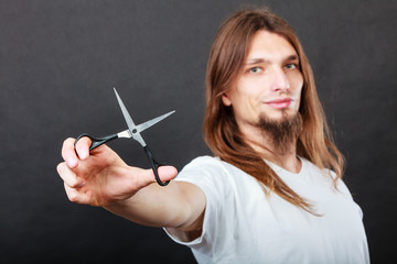 Fototapeta premium Hairstylist with scissors in hand