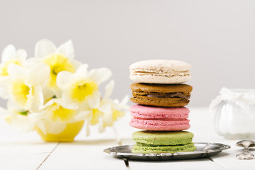 Homemade  macaroons on black vintage table.
