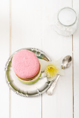Homemade  macaroons on black vintage table.